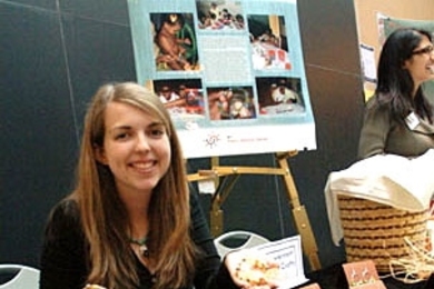 Sophomore Alia Whitney-Johnson displays some of the beaded jewelry she is selling to help young rape and incest victims in Sri Lanka. She set this table up at the March 3 MacVicar Day celebration at the Stata Center. Whitney-Johnson, a civil and environmental engineering major, taught the girls to make the jewelry.