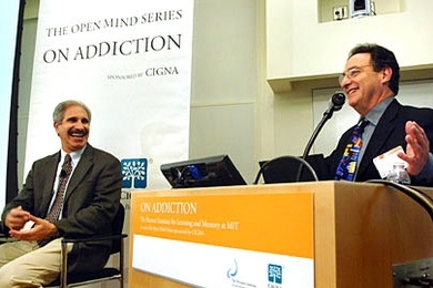 NPR 'Science Friday' host Ira Flatow, right, moderates a Picower Institute conference on addiction while Dr. Robert C. Malenka of Stanford University School of Medicine fields questions from the audience.
