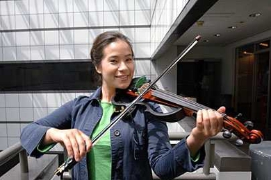 Ph.D. candidate Diana Young puts her Hyperbow into action with a Hyperviolin in June. Young developed the Hyperbow at the MIT Media Lab to measure differences in bowing technique.