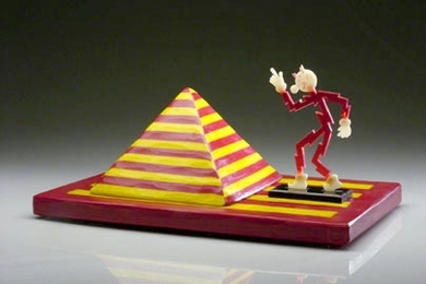 Reddy Kilowatt, right, a glass sculpture by Richard Marquis, combines classical and contemporary glass techniques then adds a good dose of whimsy.