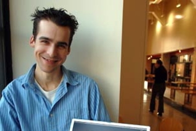 Francois Proulx, a visiting student from Montreal and an iFIND project leader, displays an iFIND map showing where his friends are on campus.