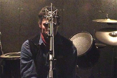 Still from Anri Sala's video "Natural Mystic (Tomahawk #2)," part of the MIT List Visual Arts Center exhibit "Sensorium: Embodied Experience, Technology and Contemporary Art." In the piece, a lone musician vocalizes the ominous yowl of a tomahawk missile as it gets louder and louder, goes silent and suddenly explodes.