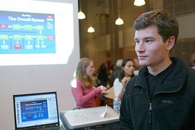 Zachary LaBry, a junior in aeronautics and astronautics, listens to information on a student-led effort to bring biodiesel to campus at the second Re-Generator event on energy initiatives.