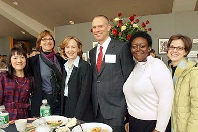 Tamako Harrington, Judy Daniels, President Susan Hockfield, Jim Harrington, Elizabeth Pierre and Jamie Fabianski celebrated after Jim Harrington won an Excellence Award.