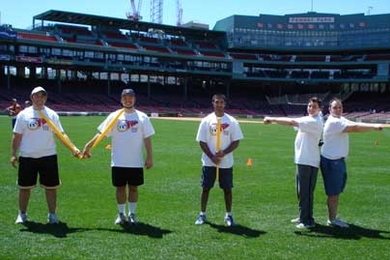 MIT students spell out their alma mater's initials in the Fenway Park outfield. Students Jonathan Schechter (left), Shawn Sullivan, Naveen Krishnan, Jeff Hoff and Larry Colagiovanni were there for the "Wiffle Your Way to Fenway" championship.