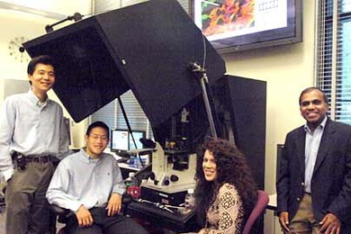 From left, research scientists Ming Dao and Kuangshin Tai, Ph.D, Professor Christine Ortiz, and Professor Subra Suresh with equipment they used to investigate bone structure.