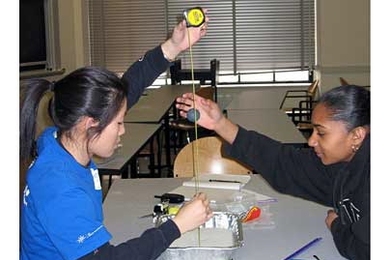 Jenny Ruan '07, left, works with eighth-grader Sabrine Sousa as part of the Public Service Center's SciPro program, which matches MIT students with teenagers in Boston and Cambridge to work on science projects.  <a onclick="MM_openBrWindow('awards-psc-enlarged.html','','width=509, height=583')">
<span onmouseover="this.className='cursorChange';">Open image gallery</span>
</a>
<noscript> <a href...
