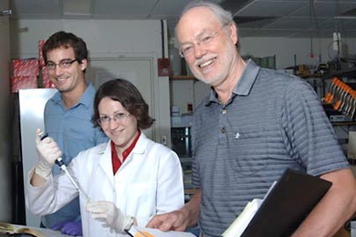 MIT post-doc Joel Neilson, left, graduate student Margaret Ebert and Institute Professor Phillip Sharp have developed a new technique to study the function of microRNA that could shed light on the genetic material's hypothesized role in cancer.