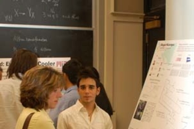 Sophomore Xavier Gonzalez, right, shows his team's poster to judge Cora Leibig, an MIT alum who works at Dow Chemical. Gonzalez' team, Biogas Nicaragua, finished second in the MADMEC contest, held Sept. 25, 2007. <a onclick="MM_openBrWindow('madmec-1-enlarged.html','','width=509, height=583')">
<span onmouseover="this.className='cursorChange';">Open image gallery</span>
</a>
<noscript> <a href=...
