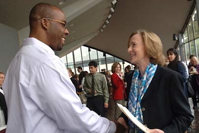 MIT President Susan Hockfield greets Lawrence Neeley, a postdoctoral associate in mechanical engineering, following the Oct. 2 State of the Institute Forum in Kresge Auditorium on Oct. 2.