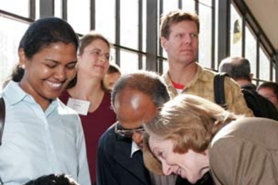 President Hockfield greets young Siva Sambasivam of Sarasota, Calif., who came with his mother, Nachiyar, and father, Chidambara, to Family Weekend, Oct. 12-13, to visit his sister, freshman Sivakami.