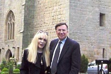 Stuart Madnick, Baron of Langley, and his wife, Yvonne, stand before their 14th-century castle in Northumberland, England.