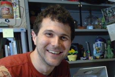 Mechanical engineering graduate student Barry Kudrowitz, who teaches a toy product design course at MIT, began his design life building an Epcot theme park out of LEGOs. Here he is shown with some of his more
recent creations.