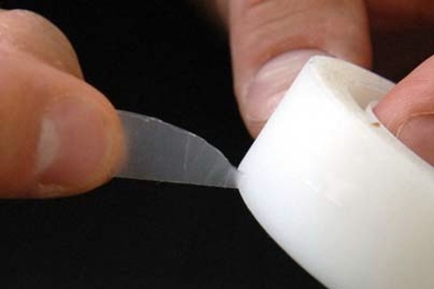 Pedro Reis, an instructor in applied mathematics at MIT, and colleagues have reported the formulation and physics behind the pattern created by adhesive tearing. In this image, Reis demonstrates the way that adhesive tape tears in a triangular shape coming a point.