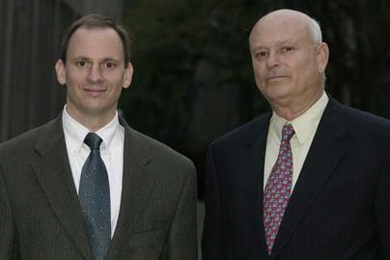 Emanuel E. Landsman '58, SM '59, ScD '66 and his wife, Sheila E. Landsman, have given $4 million to the MIT Laboratory for Electromagnetic and Electronic Systems and the Department of Electrical Engineering and Computer Science. Landsman is shown here with Associate Professor David Perreault, left, the inaugural holder of the Landsman Career Development Professorship.