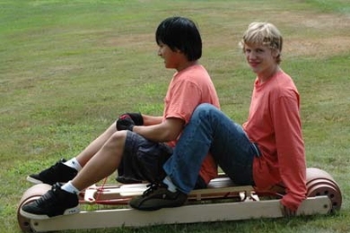 Members of the Design Squad Red Team test their prototype 'summer sled' for L.L. Bean. <a onclick="MM_openBrWindow('design-sled-enlarged.html','','width=509, height=583')">
<span onmouseover="this.className='cursorChange';">
<strong>Open image gallery</strong>
</span>
</a>
<noscript> <a href="design-sled-enlarged.html">
<em>(no JavaScript)</em>
</a>
</noscript>