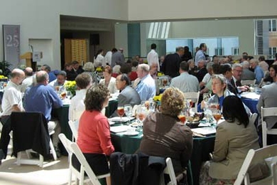 New members talk during the induction ceremony.