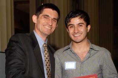 Department of Civil and Environmental Engineering head Professor Patrick Jaillet congratulates Jose Alberto Ortega on winning the Maseeh Award for excellence as a teaching assistant. The graduate student from Cuenca, Ecuador, was nominated by the faculty and students he assisted in 1.050 Engineering Mechanics I.