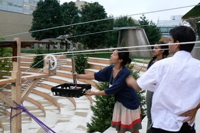 A team from the International Development Design Summit at MIT created a cable-car-like ropeway to transport goods uphill.