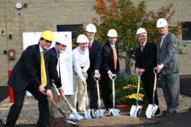 The groundbreaking ceremony for the new computer center at the MIT-Bates Linear Accelerator Center included, from left, Bolek Wyslouch, professor in physics and the Laboratory for Nuclear Science (LNS);
Robert Redwine, professor of physics and director of MIT-Bates; Karen Dow of LNS and associate director of MIT-Bates; Ed Bertschinger, head of the MIT Department of Physics; Brad Black, principal ...