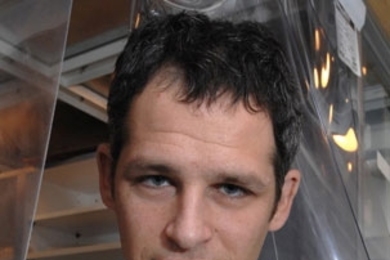 Professor Benjamin Weiss, of the department of Earth, Atmosphere and Planetary Sciences, reports oldest known records of planetary magnetic fields, which are a key to understanding early planetary evolution. Here he holds a sample of the vesicular basaltic meteorite named D'Orbigny that he analyzed as part of this study.