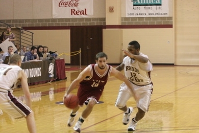 Senior guard Bradley Gampel drives to the basket during the MIT men's basketball team's NCAA Div. III tournament game against Rhode Island College on March 6.
