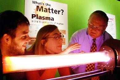 Mr. Magnet, a.k.a. Paul Thomas (right), oversees a plasma demonstration with Melissa Hornstein and Ken Marr.