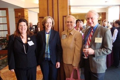 President Susan Hockfield along with 50-year employee Professor Laurence Retman Young, far right, welcomes new members SharonLeah Brown, left, and Elizabeth Zotos to the Quarter Century Club.
