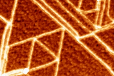 The crystallographic structure of a sheet of graphene is revealed in this Atomic Force Microscope picture.
