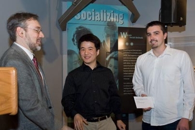 Department of Electrical Engineering and Computer Science Associate Department Head Duane Boning presents the George C. Newton project prize -- 6.111 to Tony Kim (Hyun) and Nevada Sanchez for video acquisition multi-touch controller.