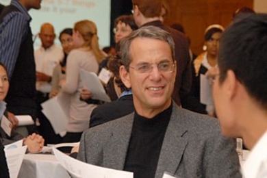 Alumni coach Paul Edelman '78 participates in ice-breaking exercises at the 3rd annual Community Catalyst kick-off event. 