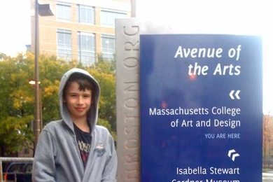 The first "Lost in Boston" sign, intended to more easily guide people around the city. This sign is located near the Massachusetts College of Art and Design.