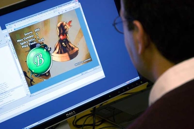 A visitor tests his hand at playing 'Pierre' at the Singapore-MIT GAMBIT Game Lab one Friday afternoon.
