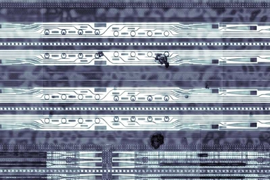 In the prototype optical chip shown here, the circles in the top two rows are "ring resonators" that can filter out light of different wavelengths.