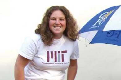Tish Scolnik poses with a folding three-wheeled wheechair prototype.