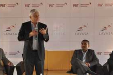 From left to right, Richard de Neufville, professor of engineering systems and of civil and environmental engineering; Ajit Gulabchand, chairman, Lavasa Corporation, Shri; Praful Patel, minister for civil aviation, Union Government of India; and Bhaskar Pant, executive director of MIT Professional Education at the commencement of the three-day workshop on airport and sirlines systems at Lavasa.
