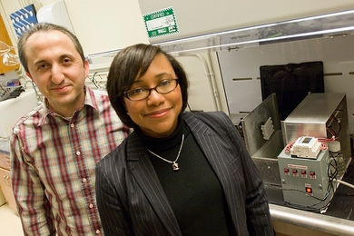 Postdoctoral researcher Avni Argun and professor Paula Hammond in the lab where they developed new technology for making fuel-cell membranes.