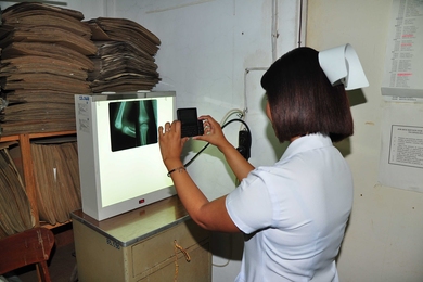 A nurse in the Batanes Provincial Hospital uses Moca to upload a patient's X-ray as a
teleradiology case.
