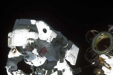 Astronaut and MIT alumnus Robert L. Satcher Jr. '86, PhD '93, STS-129 mission specialist, participates in a spacewalk in 2009.