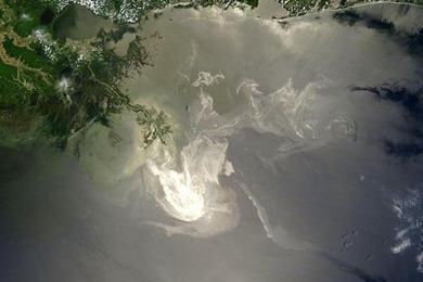 This image, taken by NASA's Terra satellite, shows the growing oil slick in the Gulf of Mexico reflected by the sun.