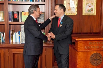 Elazer Edelman, right, shakes hands with Spanish Ambassador Jorge Dezcaller at a ceremony on June 18 in which Edelman was presented with the Spanish Order of Civil Merit.