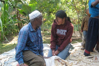 Jodie Wu conducting a needs assessment with farmers in Tanzania