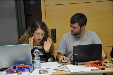 Graduate student Daniel Selva, one of the new MISTI grantees, discusses space strategies with a European student at the "New Space Missions for Understanding Climate Change" workshop.
