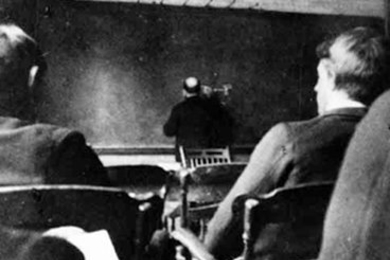 Charles Cross, a member of MIT's third graduating class and chair of the MIT physics department when, in 1882, he created the country's first electrical-engineering curriculum, right and at blackboard, above.
