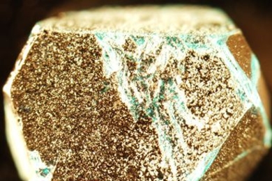 MIT physicists grew this pure crystal of herbertsmithite in their laboratory. This sample is 7 mm long and weighs 0.2 grams.
