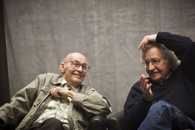 Marvin Minsky, left, and Noam Chomsky chatted as they waited for the symposium’s kickoff panel, 'The Golden Age,' to begin.