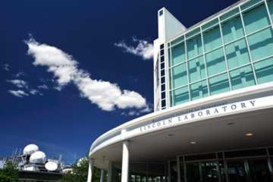 The entrance to MIT Lincoln Laboratory today (above) and in previous years (right)