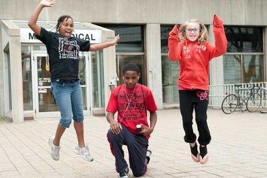 Visitors to MIT's open house on April 30 show off their free pedometers from MIT Medical. 