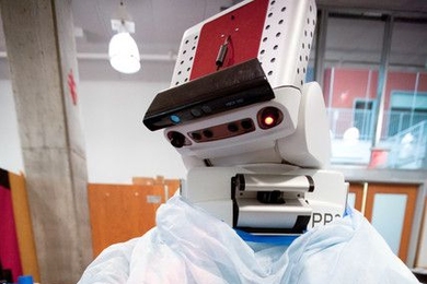 The PR2 mixes butter, one of several steps necessary for the robot to bake chocolate chip cookies.