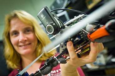 One of the speakers at TechConnect World, Mary (Missy) Cummings — associate professor of aeronautics and astronautics and and engineering systems — holds a UAV she uses in her projects.